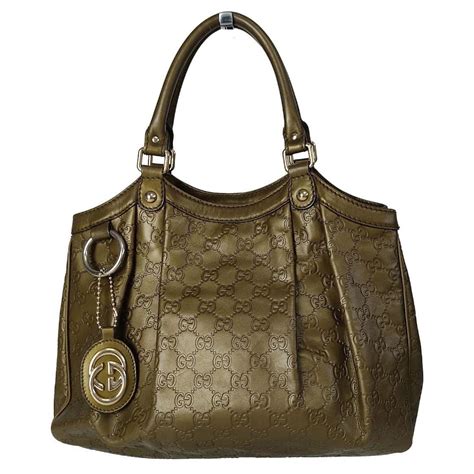 gucci bag gg and red and green|Gucci guccissima sukey bag.